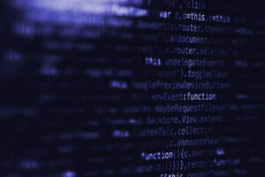 Close-up and out of focus image of code.