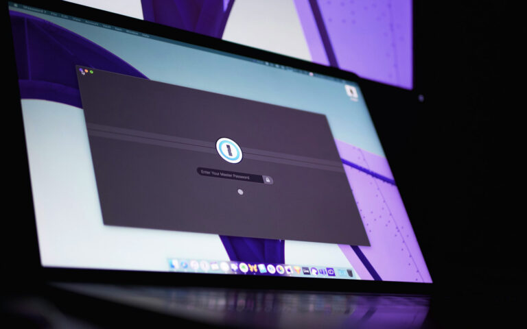 Password manager login on laptop screen.