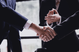 close-up of two businessmen shaking hands in agreement